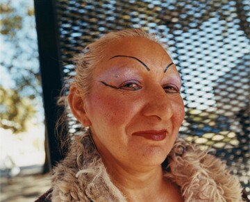 A portrait of Sabine, a local woman, at the bus stop on my street. This picture is taken from my *Paris Nord* project, which can be viewed in more detail in the *Studies *section of the website. This section brings together self-initiated projects of mine, both complete and ongoing. All of this personal work has been shot in my home country of France. - © Maciek Pożoga
